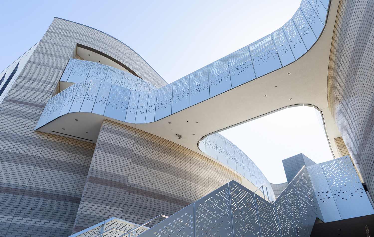 ILP building photo facing upwards with stairs at the bottom and a catwalk above